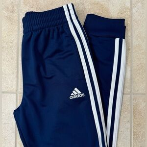 adidas Tricot Jogger Pants
Size: Medium (10-12)
Color: Navy Blue